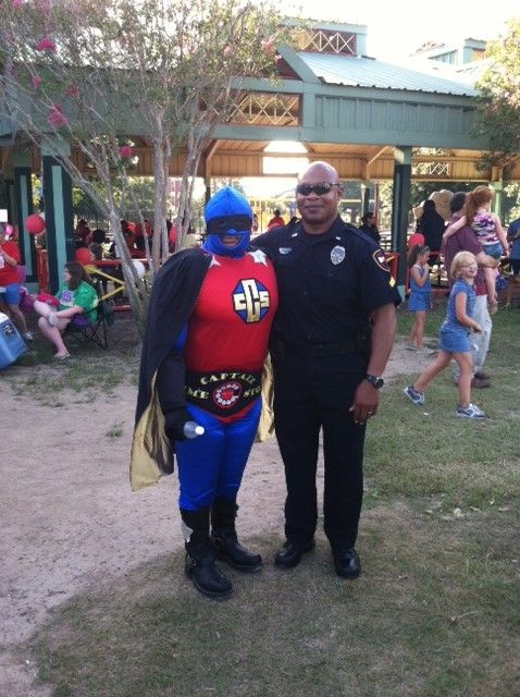Cpl Sices with Captain Crime Stopper Cpl Sices with Captain Crime Stopper